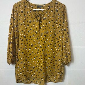 West Kei Gold Animal Print V Neck Blouse